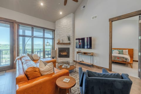Beautiful, bright open concept living room with sleeper sofa.