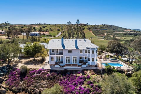 Main House back porch, hiking trail below