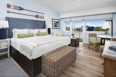 Linger in a serene king room with breezy coastal styling.