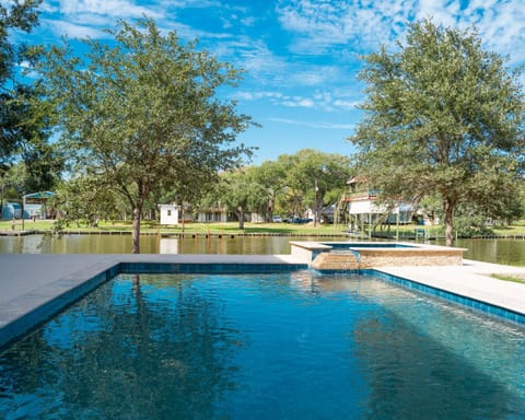 Gorgeous pool and hot tub overlooking Caney Creek