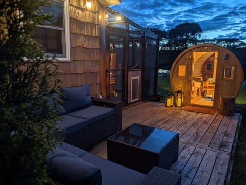 Barrel Sauna with views of the private pond