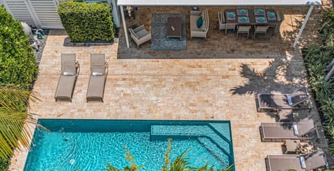 Dive into luxury and soak up the sun, just steps away from the beach in your own oasis with a heated pool.