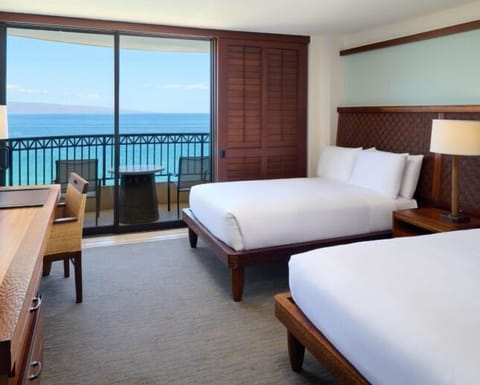 Stretch out in crisp linens with uninterrupted ocean panoramas.