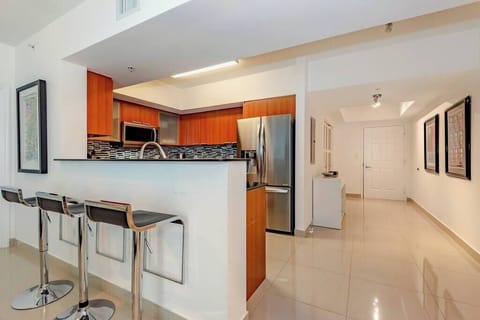 Breakfast bar and fully equipped kitchen for all your cooking needs.