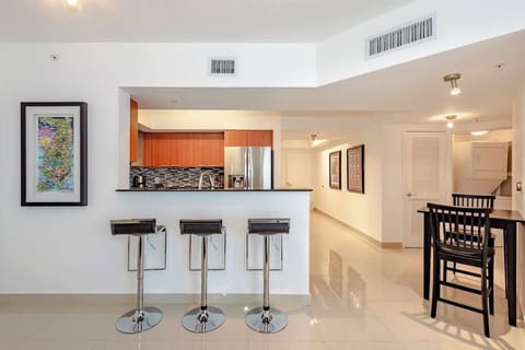 Breakfast bar and fully equipped kitchen for all your cooking needs.
