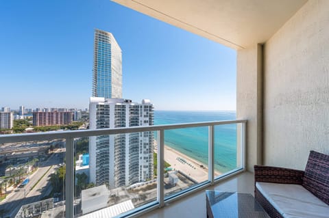 Enjoy stunning balcony views of the vibrant cityscape and twinkling skyline.