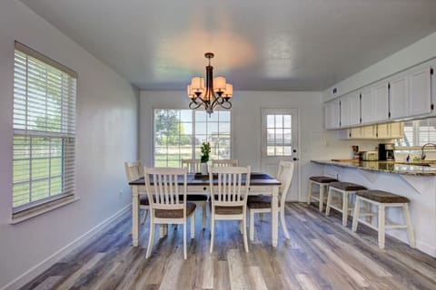 Bright Dining area with bar stools