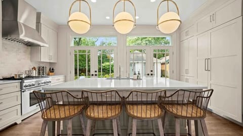 Spacious kitchen featuring a stunning island perfect spot for making memories!