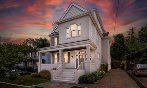 Charming, newly renovated home with modern finishes and a welcoming front porch.