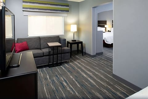 Relax in the lounge area with warm lamp-lit ambiance.