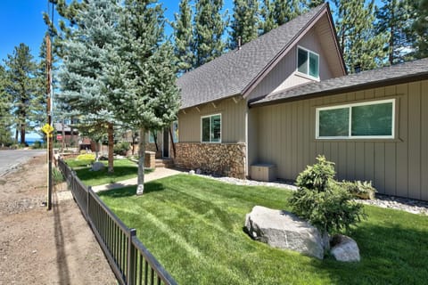 Front of home with lake just beyond