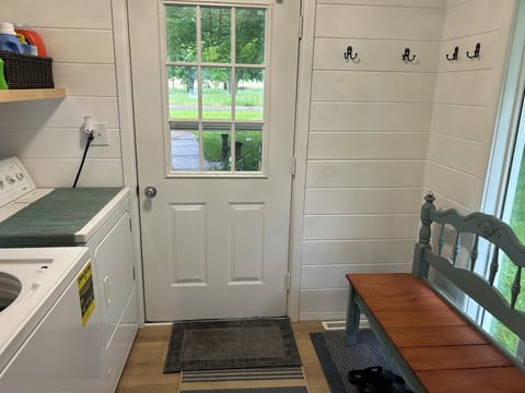 Entryway which includes washer/dryer