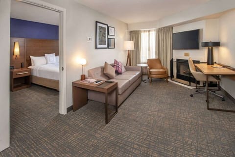 Stretch out in your spacious suite with sofa, fireplace, and desk.