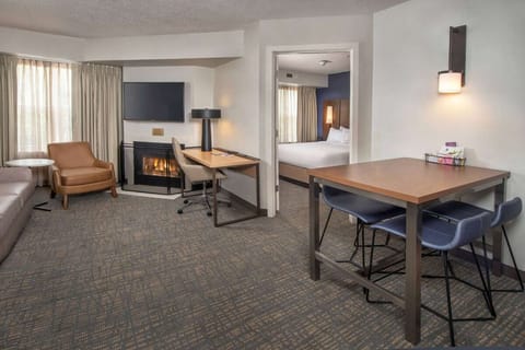 Unwind by the fireplace after a productive day away