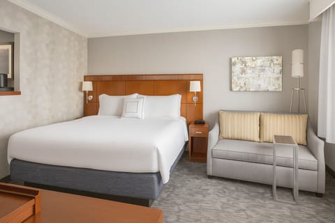 Unwind into crisp linens for a calm night’s sleep.