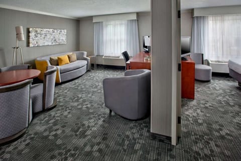 Unwind in a spacious sitting area with soft natural light.
