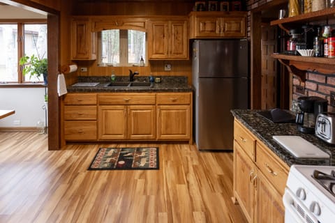 Well equipped kitchen with 19 Cubic Ft fridge and freezer.