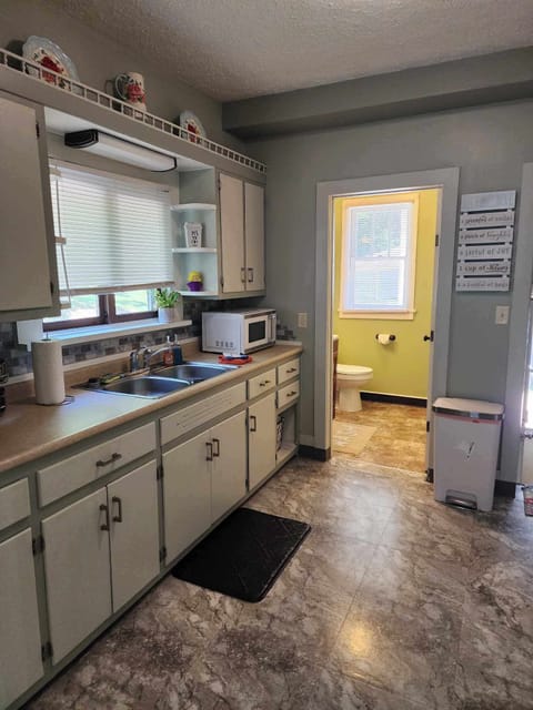 Half bath off of kitchen 