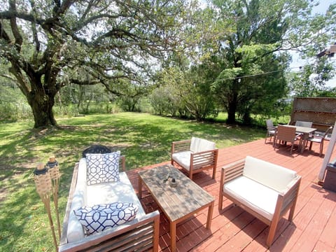 Large, private back deck with plenty of seats for everyone.