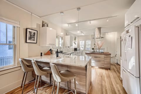 The Monroe Bungalow boasts tons of natural sounth facing light and chefs kitchen