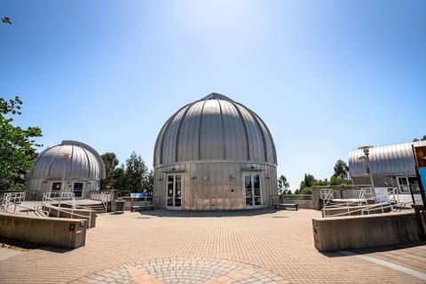 Explore striking dome architecture and enjoy open-air rooftop views.