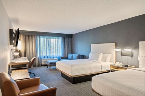 Unwind in a bright, spacious room with two comfy beds.