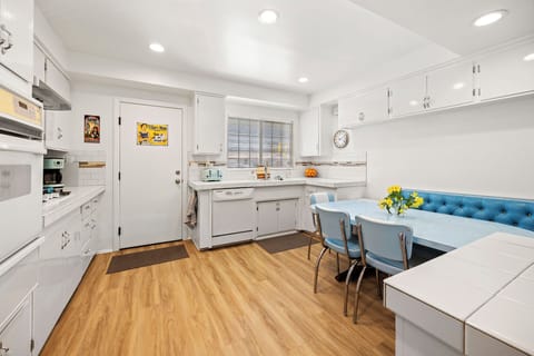 The kitchen sink area looks out to our front yard and neighborhood, letting in plenty of natural light.