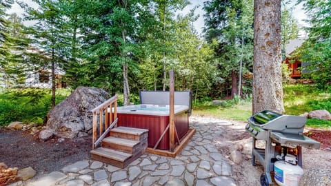 Hot tub surrounded by the pines and aspens