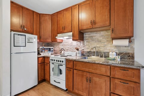 A well-appointed kitchen with microwave and coffee machine!