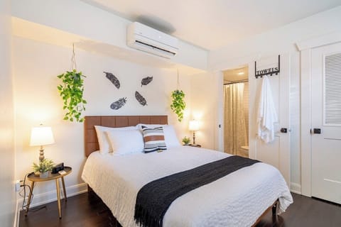 The master bedroom contains a queen bed, walk in closet, alarm clock, bedside lamp and an power hub with USB and 110V outlets.  Bamboo linens and plush duvet will help you end you evening on a luxurious note!