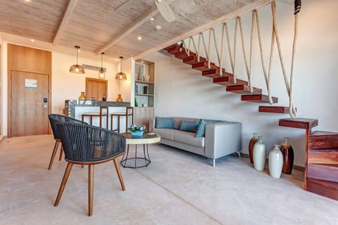 Unwind together in an airy lounge with designer details.