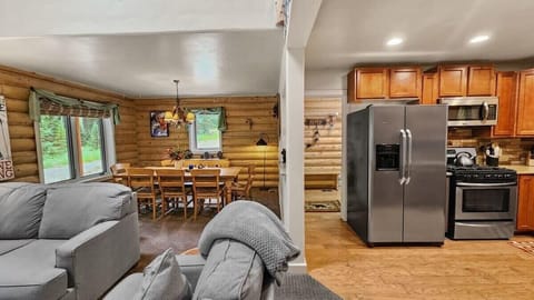 The main level of the home features an open and social layout great for groups with the living room/dining room/kitchen all connected.