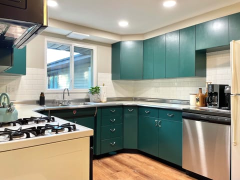 Kitchen - includes cooking utensils, pots, pans, etc. Oh did I mention there is a Nespresso maker with pods provided? And a coffee bar?!