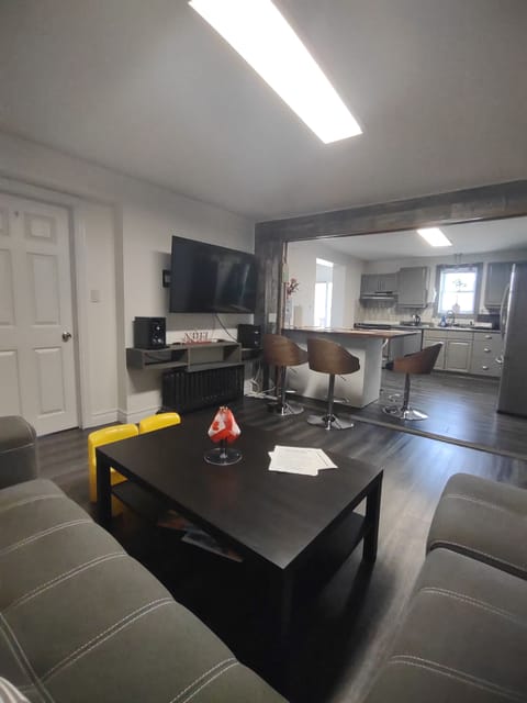 Living room open concert to full kitchen.