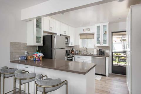 A freshly renovated kitchen is stocked with all high-quality essentials.