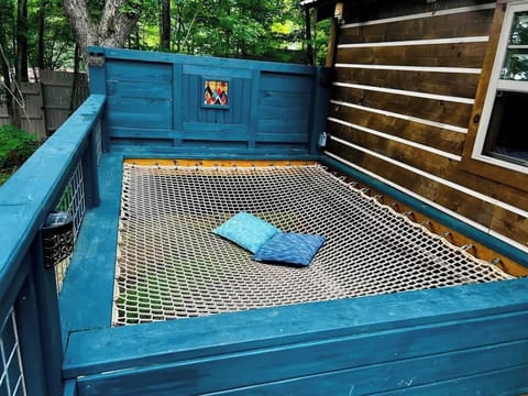 Oversized hammock built into the deck, perfect for daydreaming and taking into the sights around you