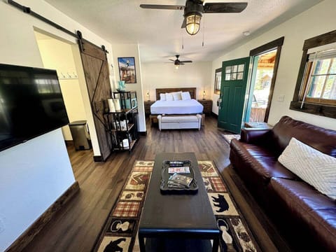Sleep peacefully in a cozy bedroom with soft linens, warm wood accents, and a true cabin feel. Wake up refreshed and ready for adventure!

