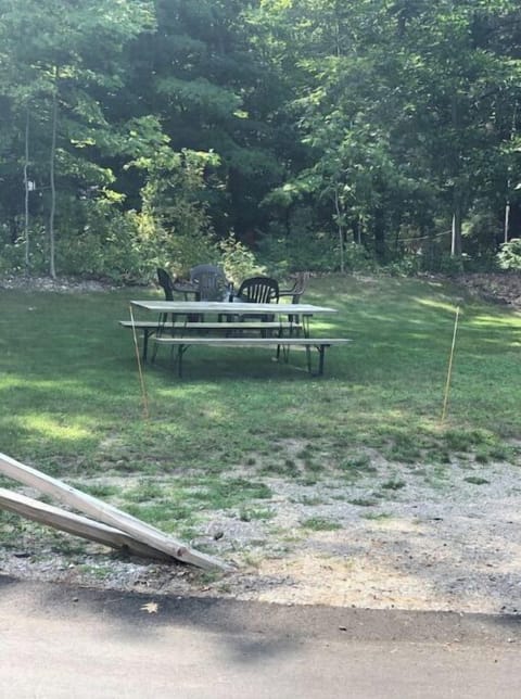 Lot for guest use. Table, chairs, fire pit.
