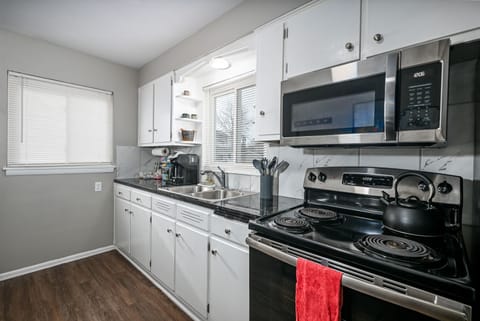 Stocked Kitchen! Utensils, place settings, pots & pans, crock pot, basic spices