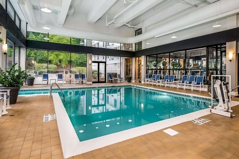 Dive into year-round relaxation in the bright indoor pool.