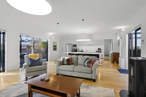 Comfortable seating by the fireplace.