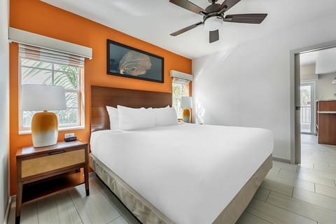 Wake up to warm colors and soft light through the window.