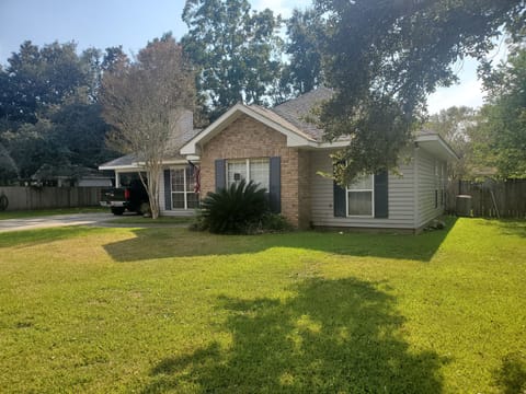 Front View of House and Carport