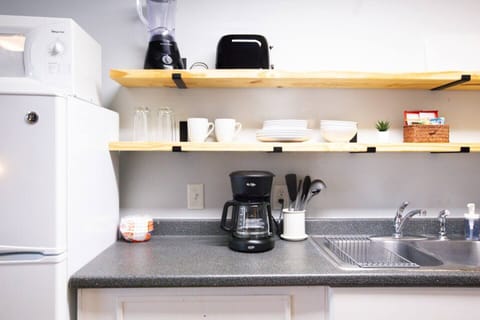 Fully equipped kitchen (coffee pot, french press, toaster, blender, pots/pans, dinnerware, utensils, cooking sheets, & more)