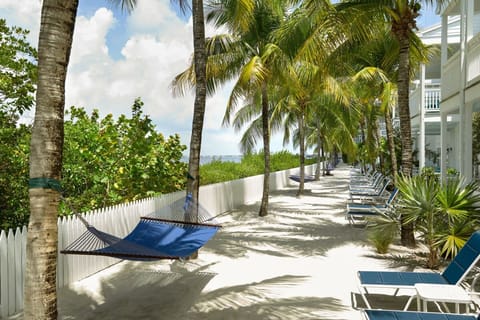Drift in a hammock while waves and palms set the mood.