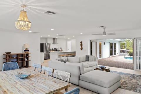 Bright and spacious living area with smart TV