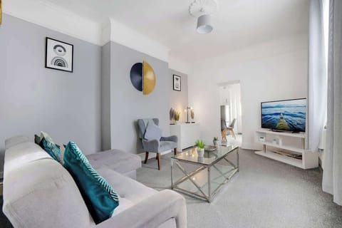 Spacious open-plan living room and a dining area, benefits from a Smart TV with Netflix and other streaming platform.