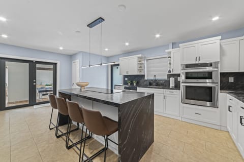 Cook up a storm in our sleek and stylish kitchen.