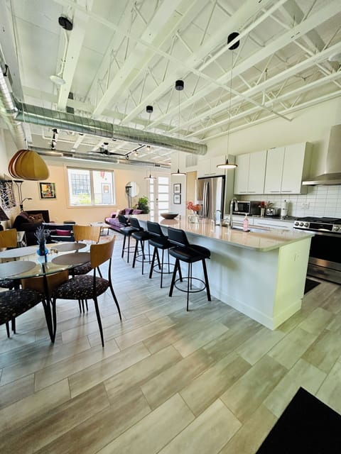 Plenty of seating in the open concept kitchen and living room