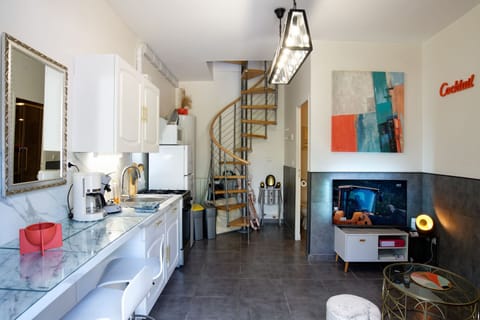 the main room and the kitchen